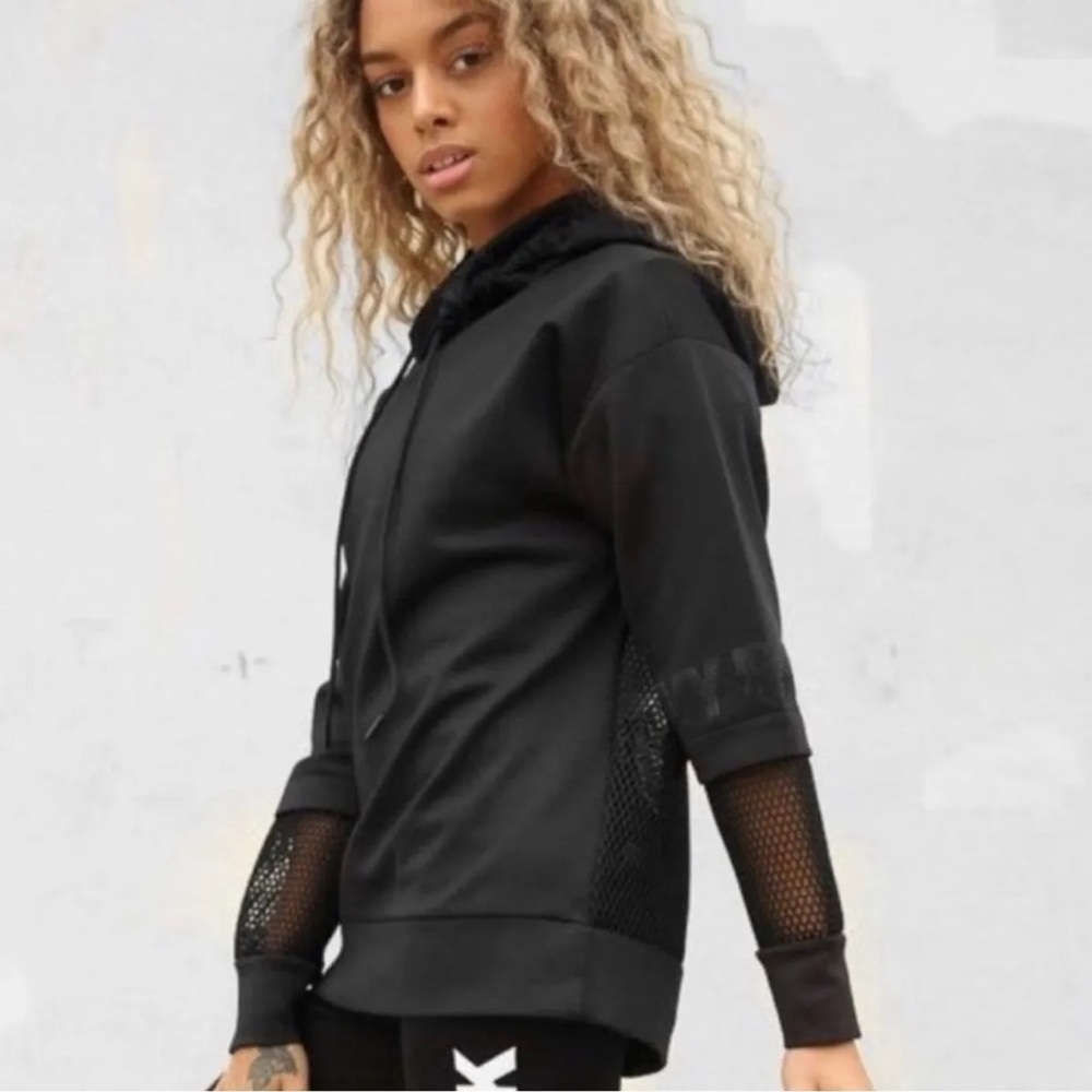 Ivy Park Adidas Hoodie with mesh back and side zip. Size medium.